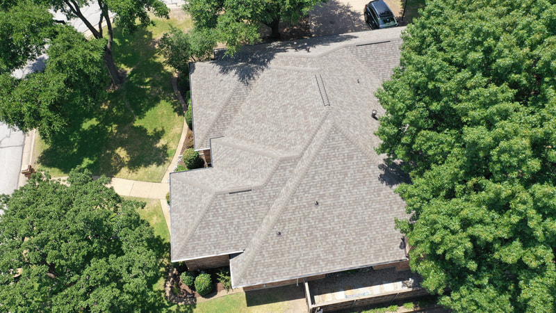Aerial view of a finished roof installation